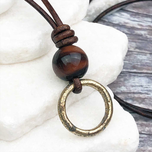 Gleaming Golden Bronze Celtic Ring Money with Red Tigers Eye Leather Necklace