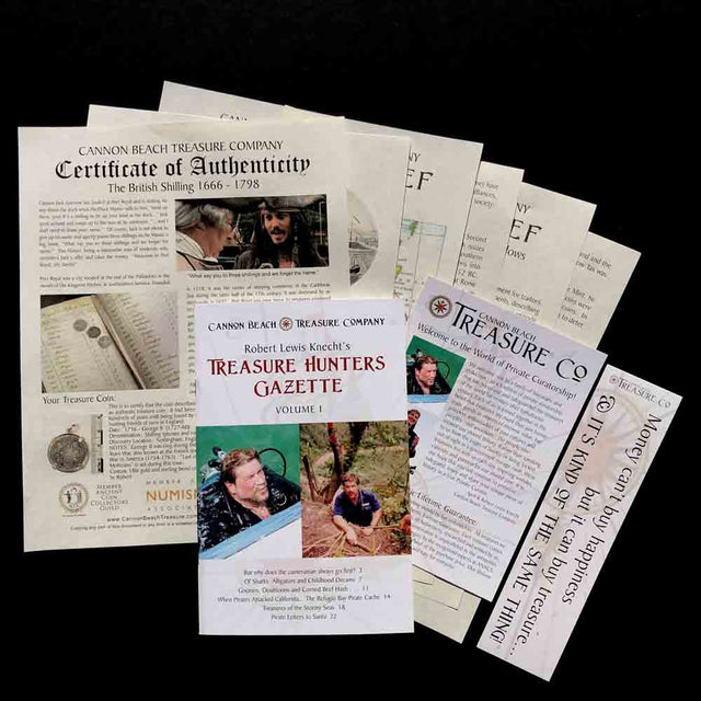 Documents scattered on a dark surface include a "Certificate of Authenticity," "Treasure Hunters Gazette," and other documenation from Cannon Beach Treasure Company, featuring images, text, and historical information about the treasure for sale.