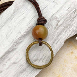 Bright Light Golden Bronze and Fancy Jasper Celtic Ring Money Leather Necklace
