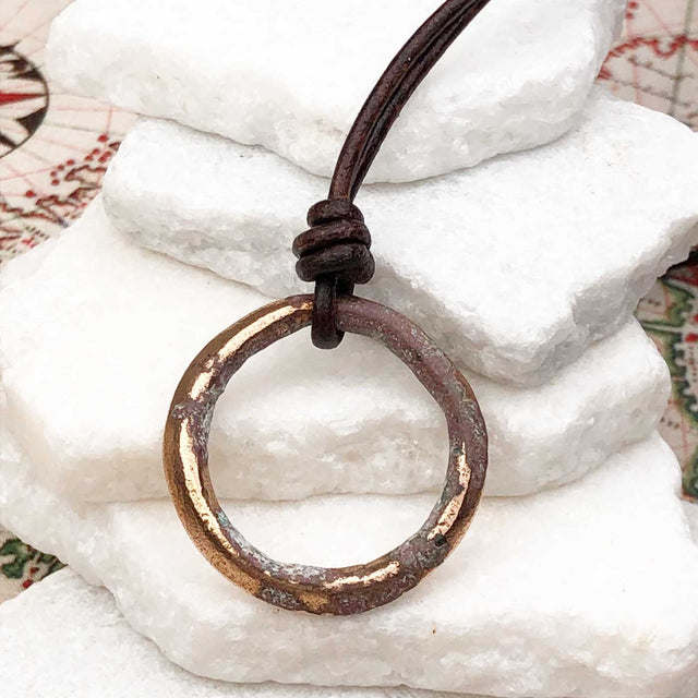 Variegated Red and Golden Bronze Celtic Ring Money Leather Necklace