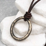 Deep Burnished Variegated Golden Bronze Oval Celtic Ring Money Leather Necklace