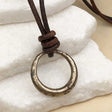 Raised Ridge Bright Golden Bronze Celtic Ring Money Leather Necklace