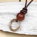 Bright Golden Bronze Celtic Ring Money with Carnelian Leather Necklace