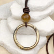 Large Bright Golden Bronze Celtic Ring Money and Citrine Leather Necklace