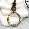 Large Variegated Golden Bronze Oval Celtic Ring Money and Tigers Eye Leather Necklace