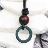 Deep Green Bronze Celtic Ring Money with Red Tigers Eye Leather Necklace