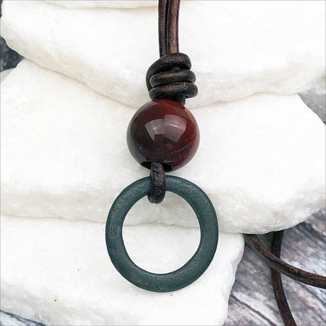 Deep Green Bronze Celtic Ring Money with Red Tigers Eye Leather Necklace