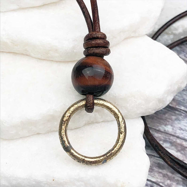Gleaming Golden Bronze Celtic Ring Money with Red Tigers Eye Leather Necklace