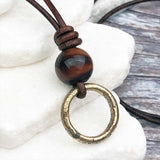Gleaming Golden Bronze Celtic Ring Money with Red Tigers Eye Leather Necklace