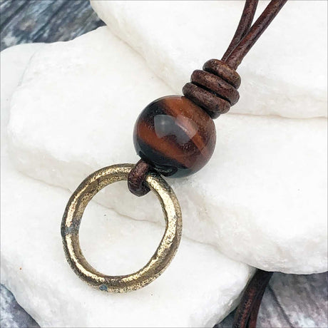 Gleaming Golden Bronze Celtic Ring Money with Red Tigers Eye Leather Necklace