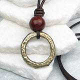 Gleaming Gold Flat Bronze Celtic Ring Money and Red Tigers Eye Leather Necklace
