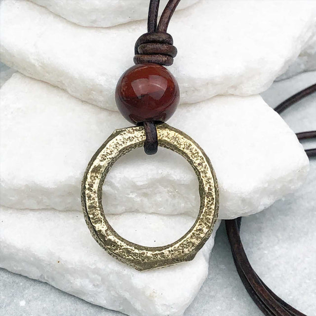 Gleaming Gold Flat Bronze Celtic Ring Money and Red Tigers Eye Leather Necklace