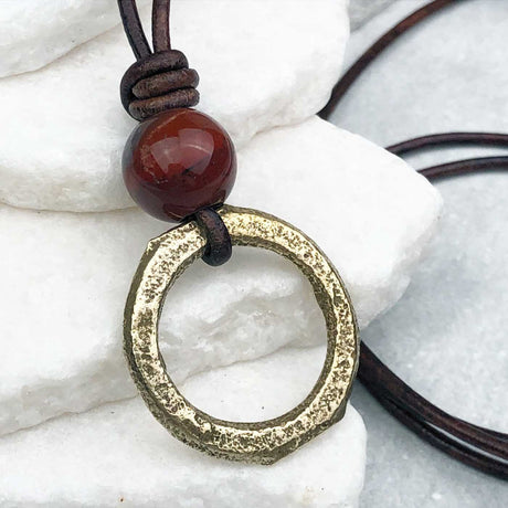 Gleaming Gold Flat Bronze Celtic Ring Money and Red Tigers Eye Leather Necklace