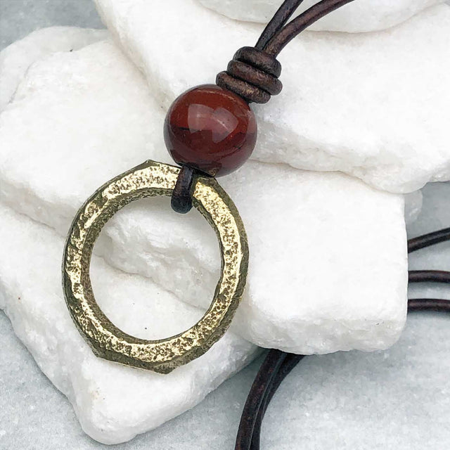 Gleaming Gold Flat Bronze Celtic Ring Money and Red Tigers Eye Leather Necklace